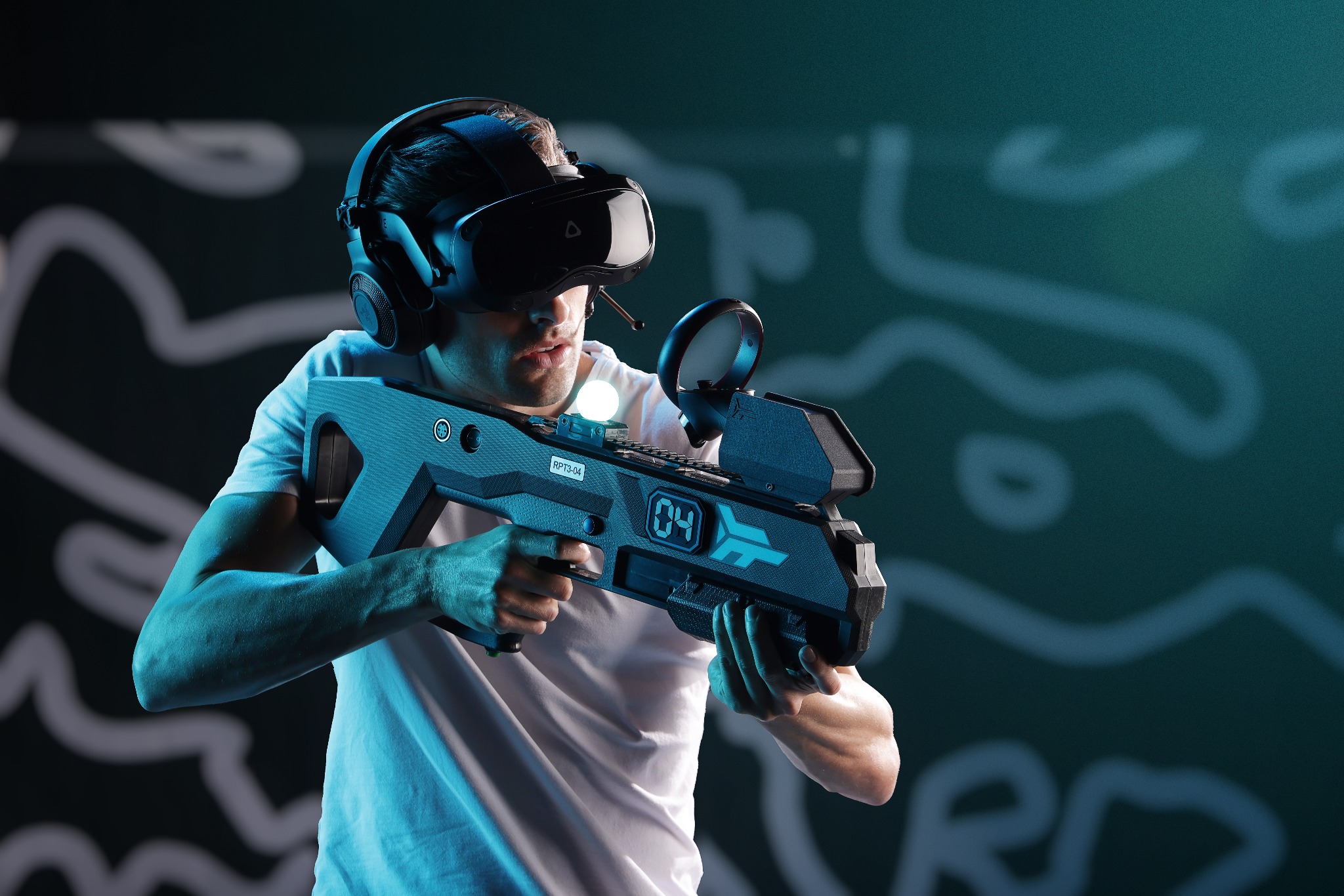 Focused Zero Latency VR player aiming a controller in the arena